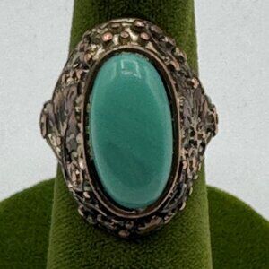 Vintage Bronze Ring With Turquoise Oval Stone & Intricate Detailing